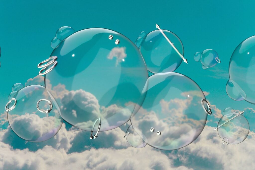 Wide shot, 3D rendering. Soap bubbles of various sizes, adorned with piercings of diverse designs, float against a backdrop of turquoise sky with grayish-green clouds.
